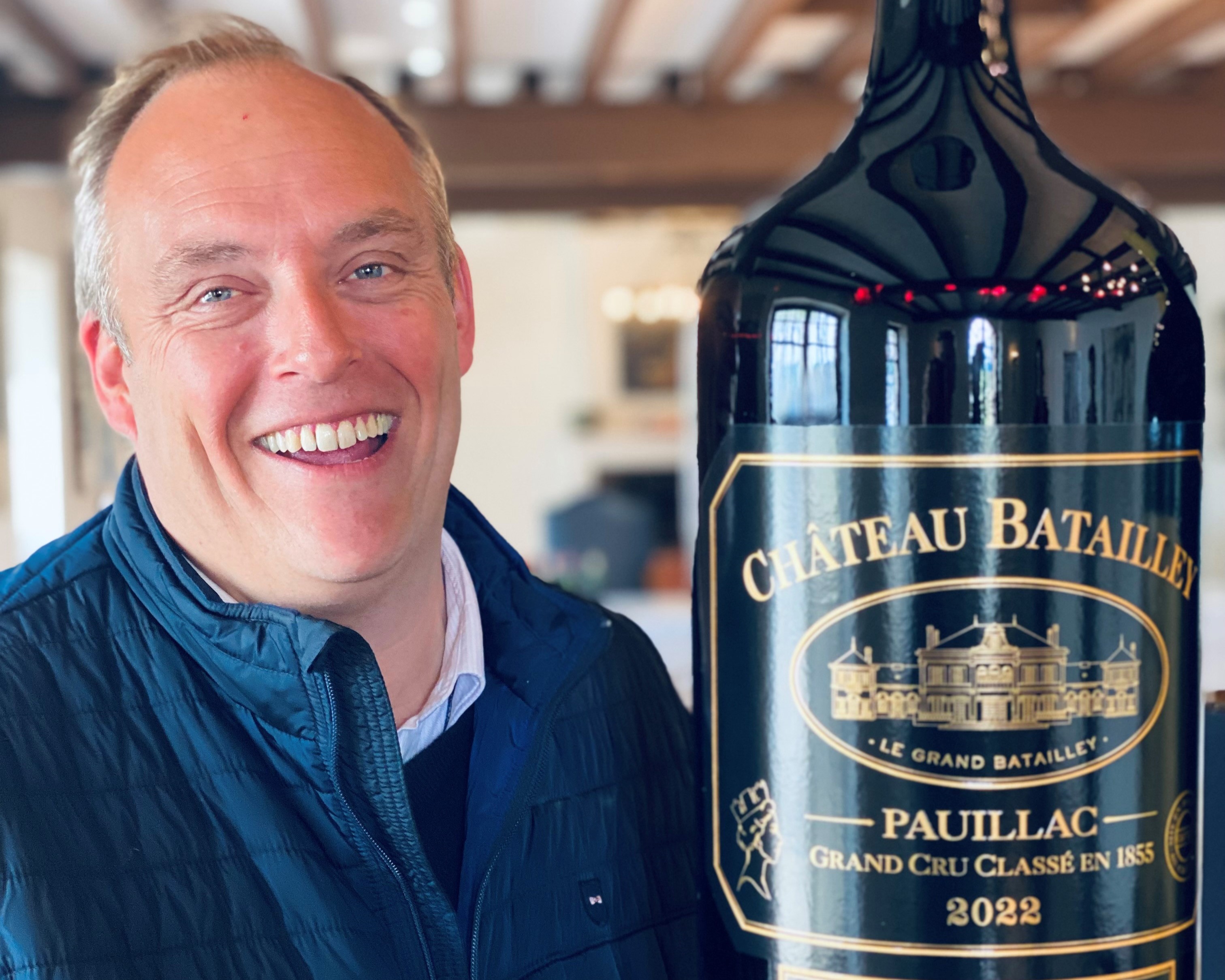 Frédéric Castéja, with a big bottle of 2022 Batailley Frédéric Castéja , with a big bottle of 2022 Batailley
